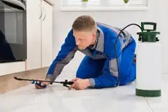 Worker using Sprayer
